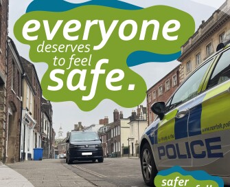 Safer Norfolk logo and cars in background