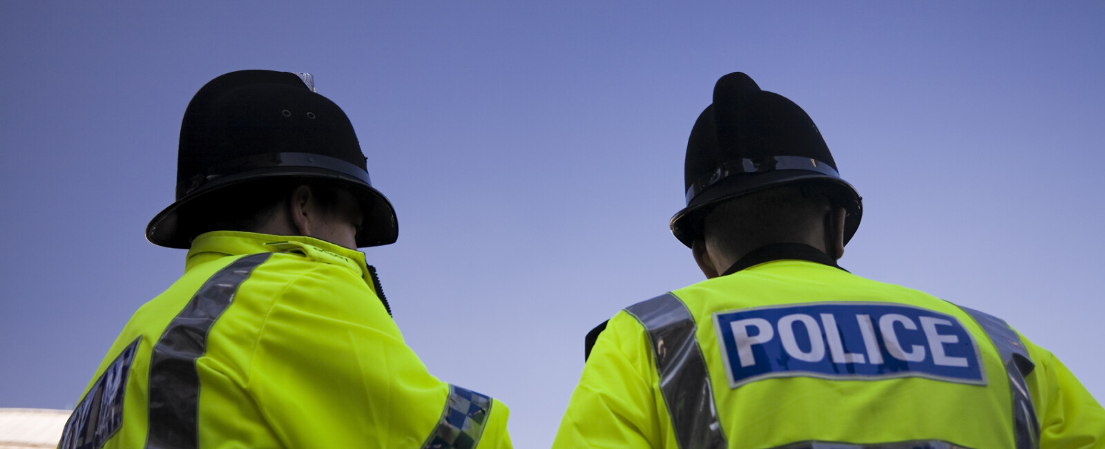 Two police officers in high vis jackets