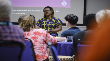 IAG member Mercy talking at event