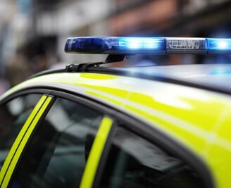 Roof of police car with lights flashing