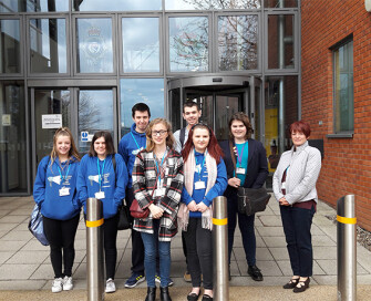 Group of Norfolk's Youth Commission standing outside police headquarters