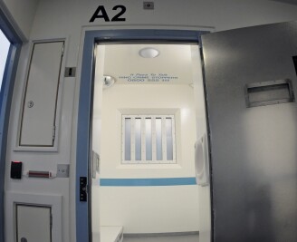 Open police cell door